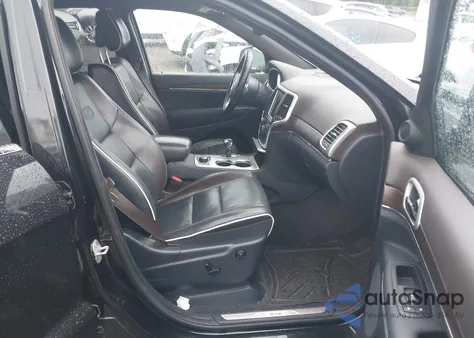 2014 Jeep Grand Cherokee Overland z USA, uszkodzony, nr VIN 1C4RJFCTXEC182339